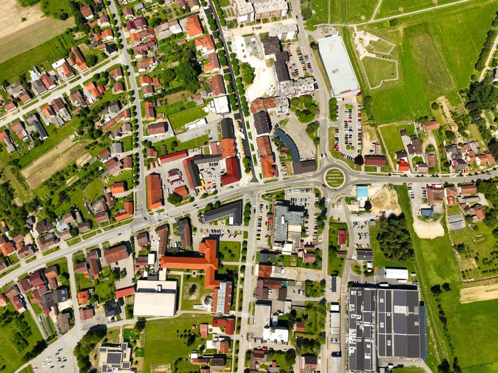 Aerial view of a town's streets and rooftops